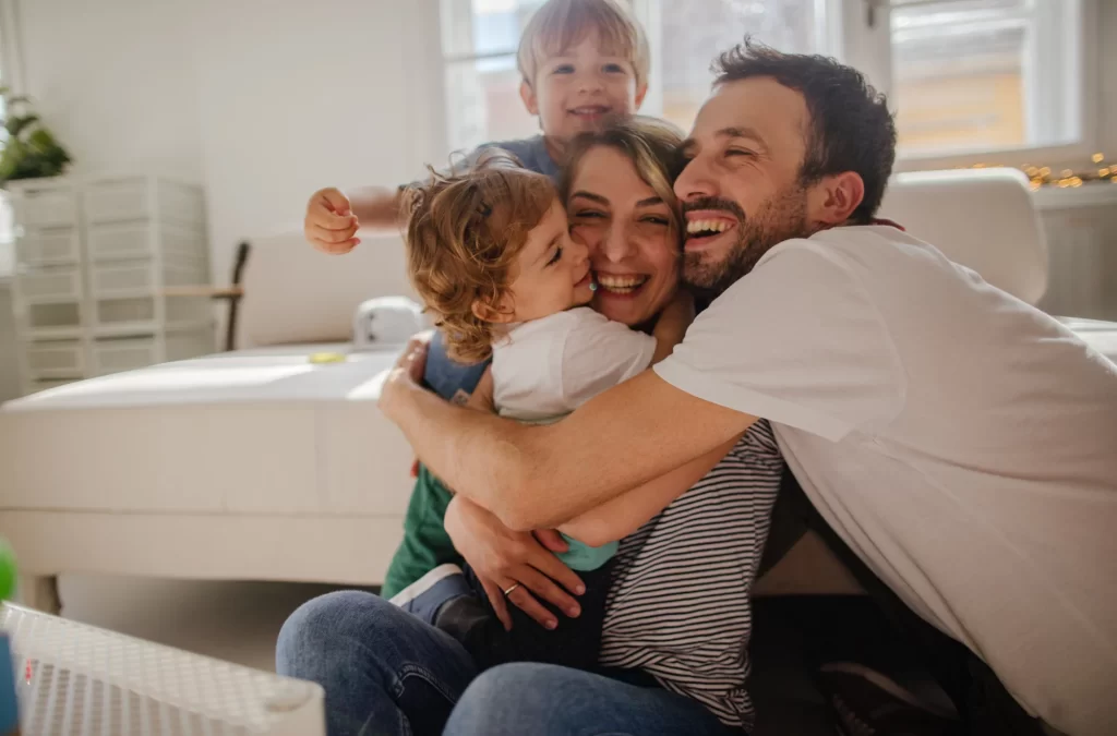 Smiling family enjoying their clean and pest-free home in Northwest Arkansas