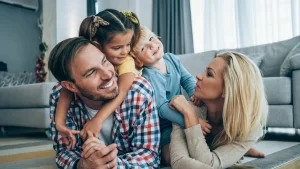 A happy family enjoying the comfort of a pest-free home thanks to professional pest control services